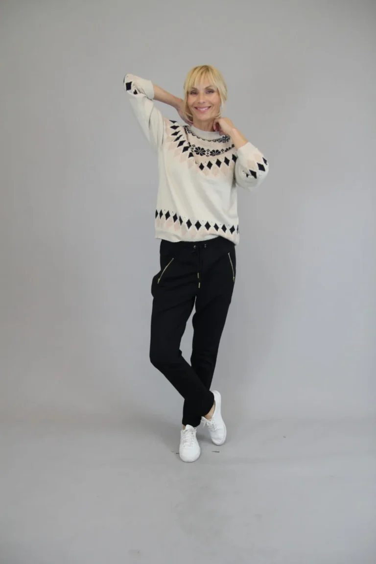 Marc Laugen mustat housut kultaisilla vetoketjuilla