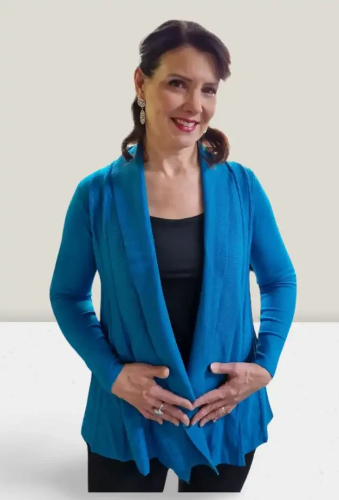 Turkoosi neuletakki.